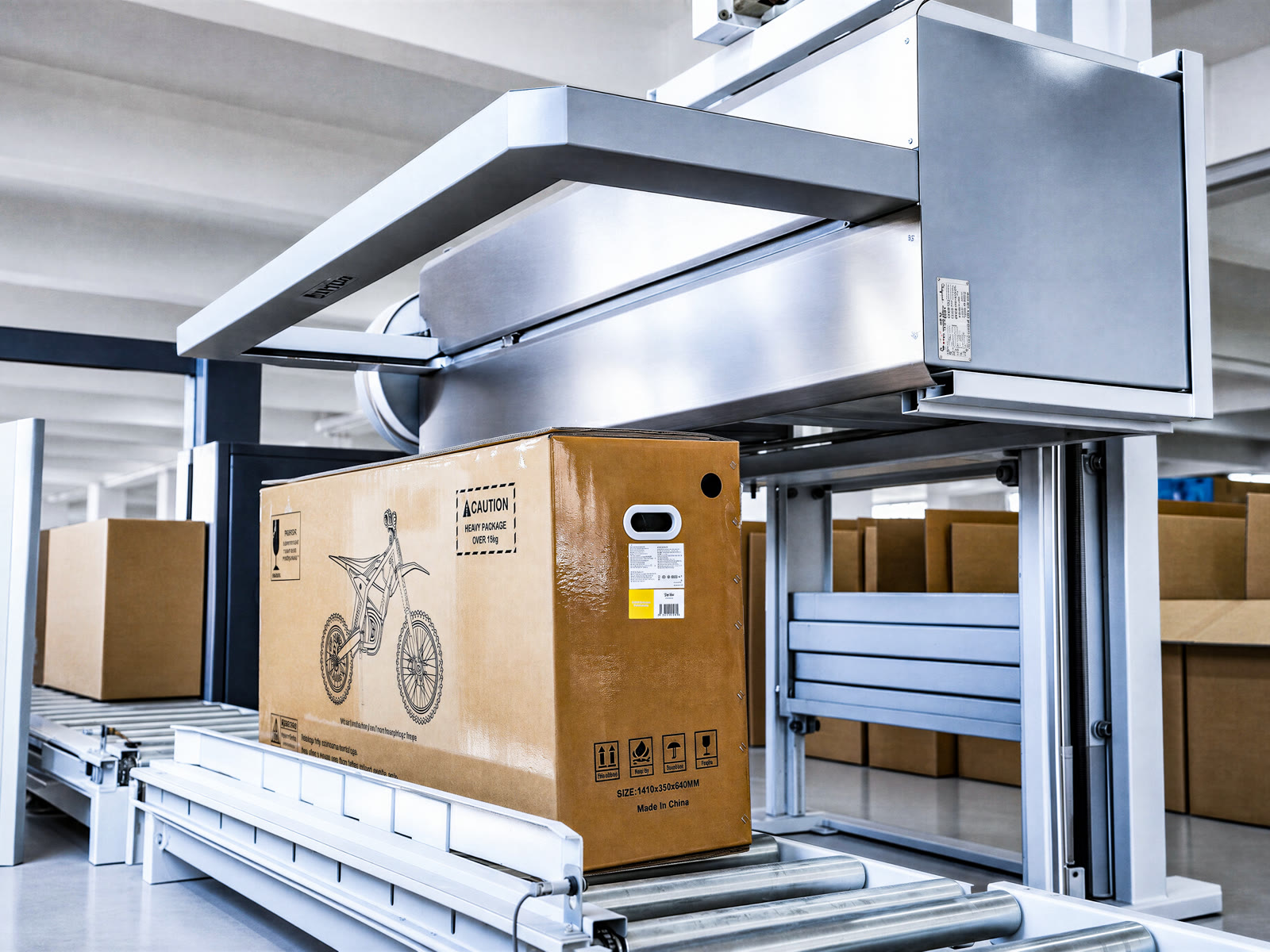 Packed electric bike moving through the factory line
